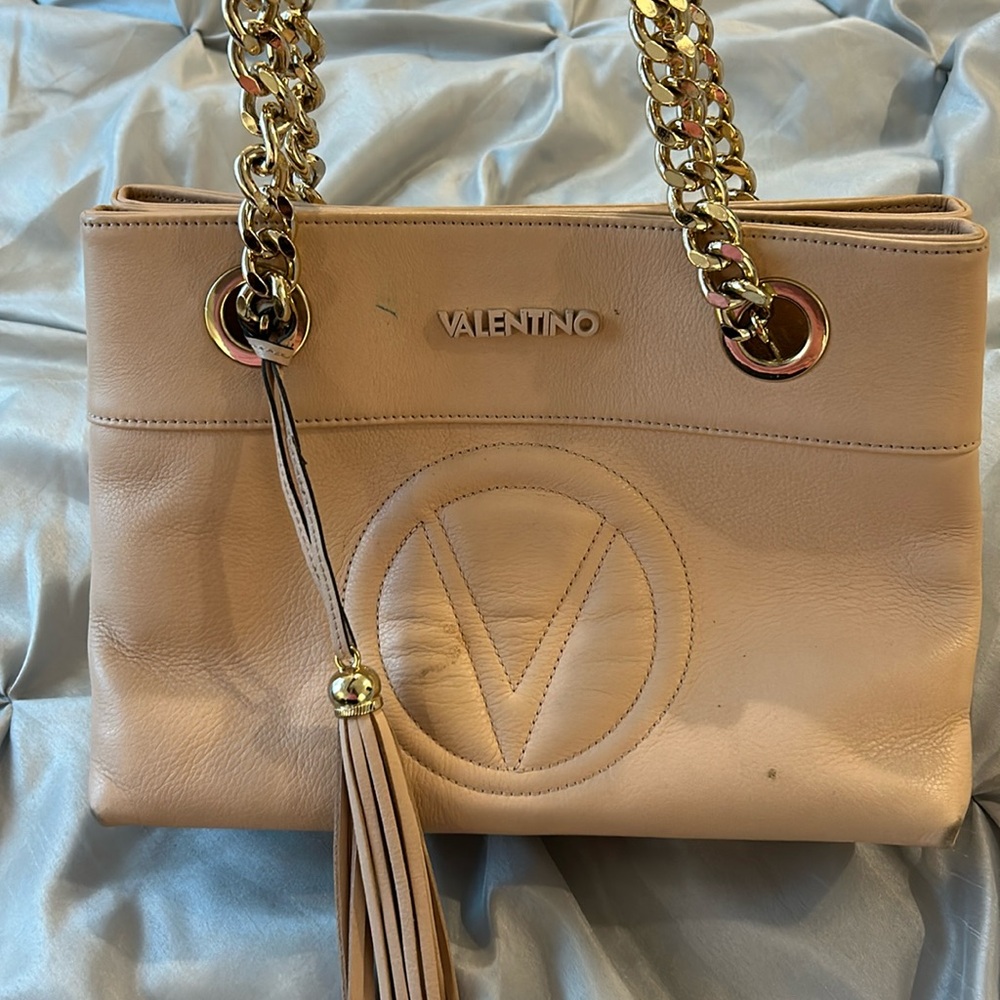 Light pink Mario Valentino bag. Fair condition.